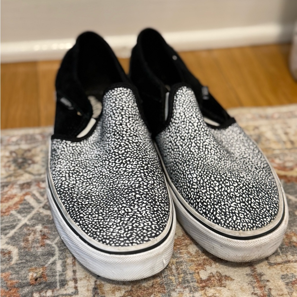 Vans Black and White Slip-On Sneakers